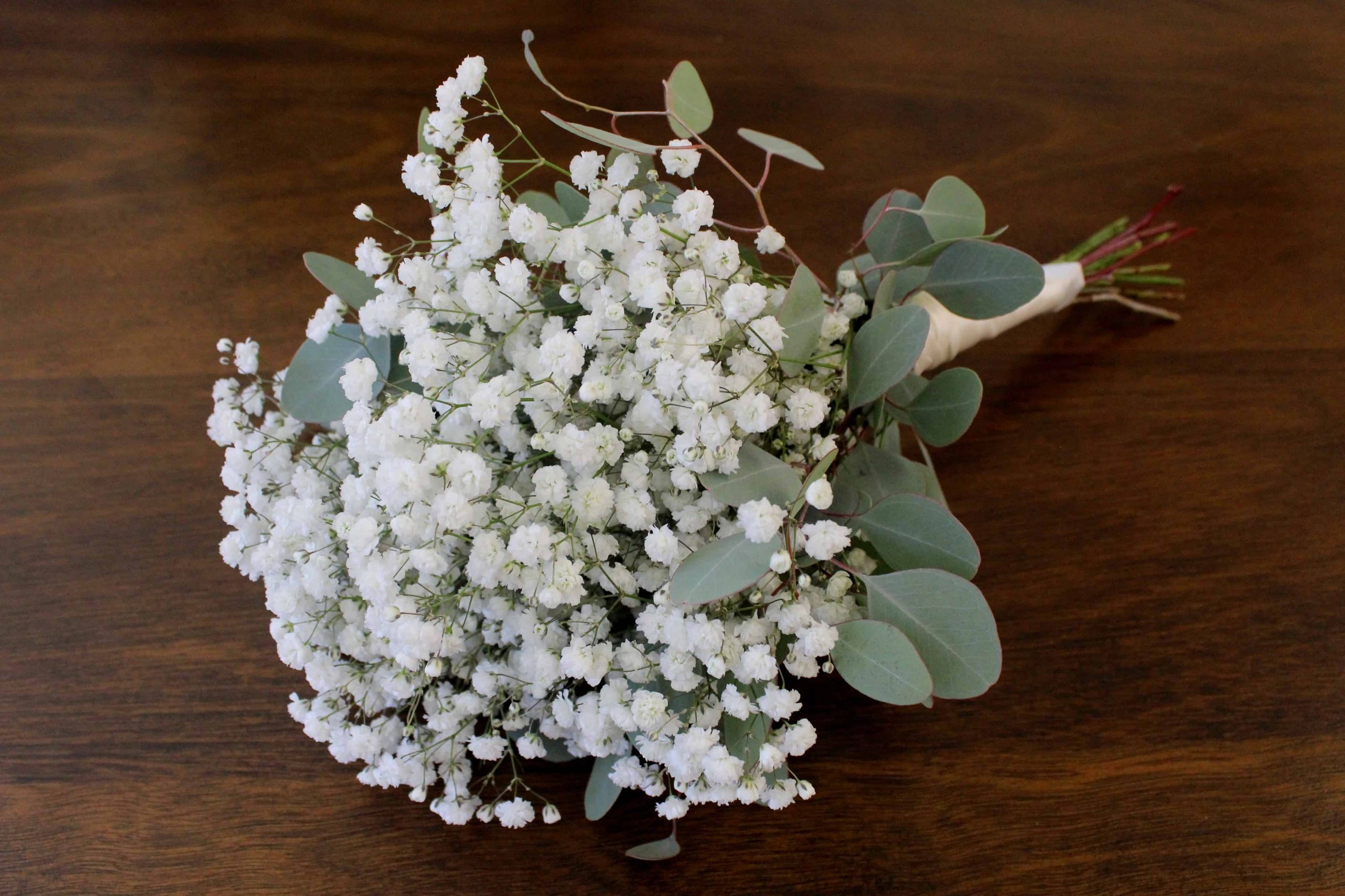 Baby’s breath bouquet with eucalyptus and satin ribbon by Studley Flower Gardens