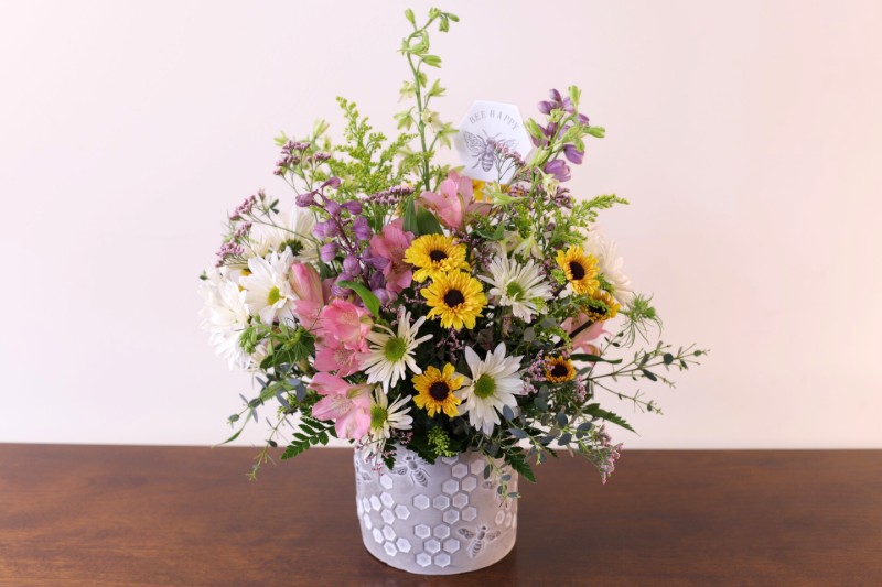 Bees Knees Bouquet with pastel blooms and bee motif by Studley Flower Gardens