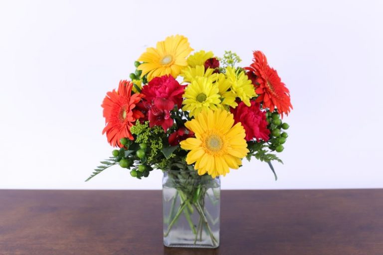 Citrus Splash Bouquet classic with vibrant orange and yellow gerbera daisies by Studley Flower Gardens