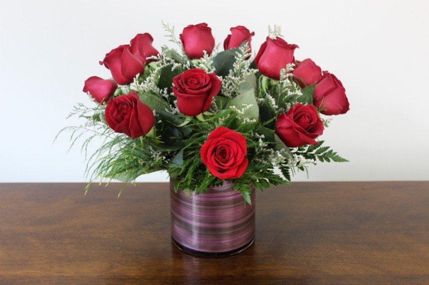 Hearts Aflutter Bouquet with deep red roses by Studley Flower Gardens