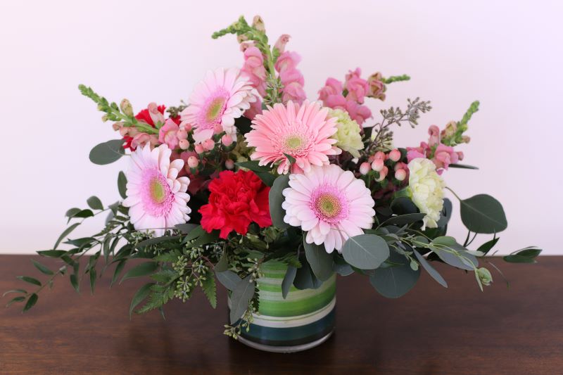 Heartsong bouquet lush pink blooms with snapdragons and eucalyptus by Studley Flower Gardens