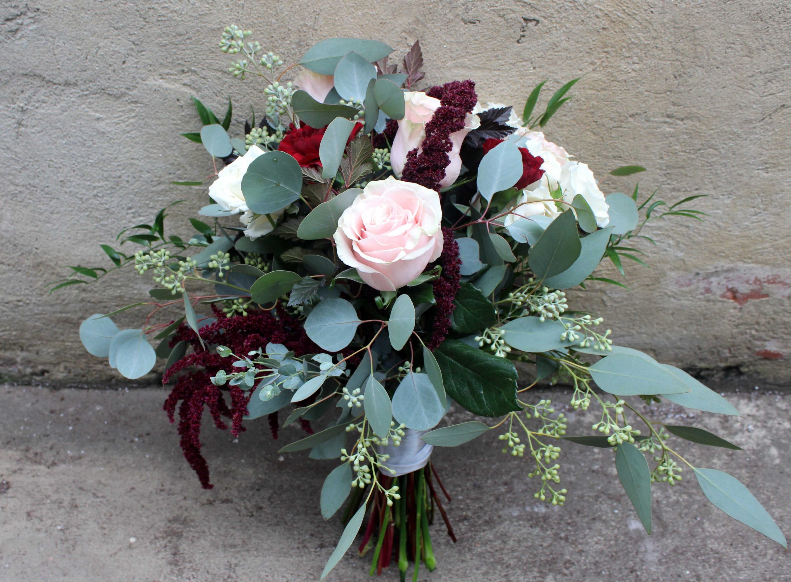 Heirloom rose bouquet with pink roses and burgundy accents by Studley Flower Gardens