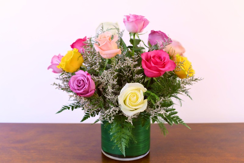Magic Moment Bouquet with pastel roses and feathery accents by Studley Flower Gardens