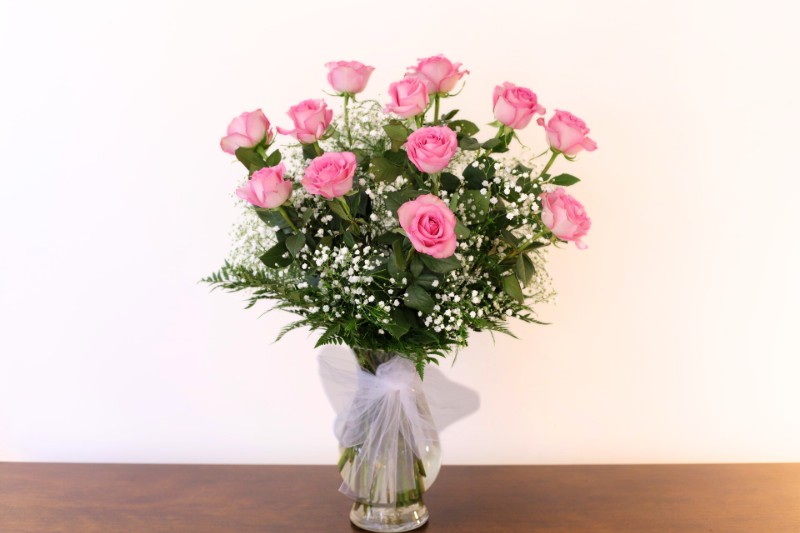One dozen pink roses classic with Baby's Breath by Studley Flower Gardens