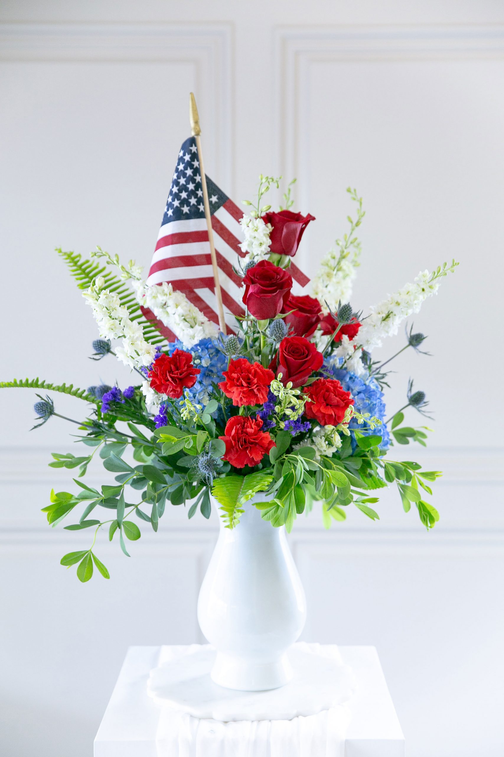 Patriotic Respect Bouquet with red, white, and blue flowers by Studley Flower Gardens