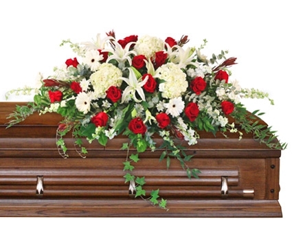 Peace Always Casket Spray with red and white flowers by Studley Flower Gardens