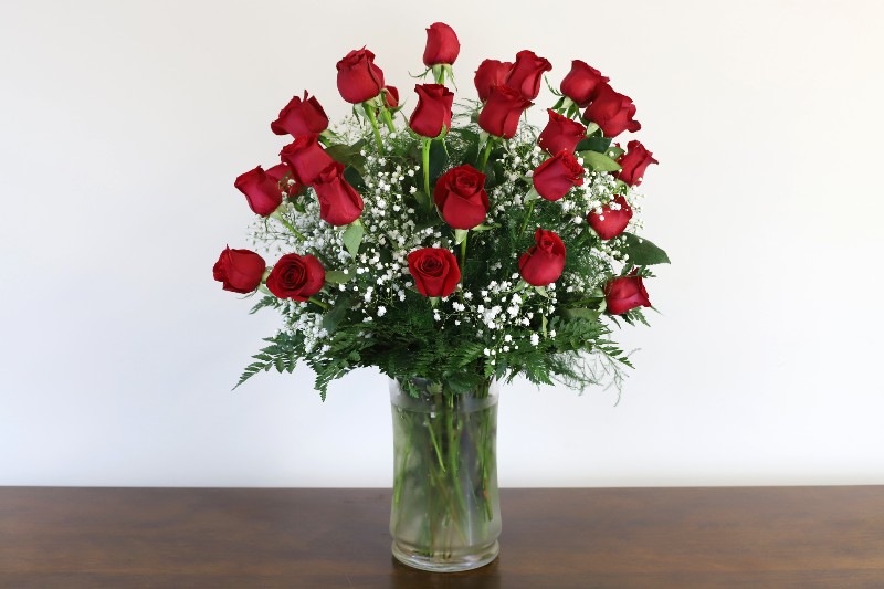 Pure Love Bouquet with red roses and baby's breath by Studley Flower Gardens