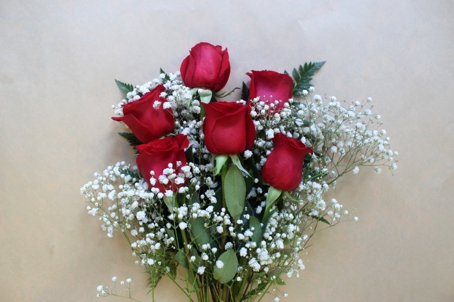 Red roses bouquet with baby's breath by Studley Flower Gardens
