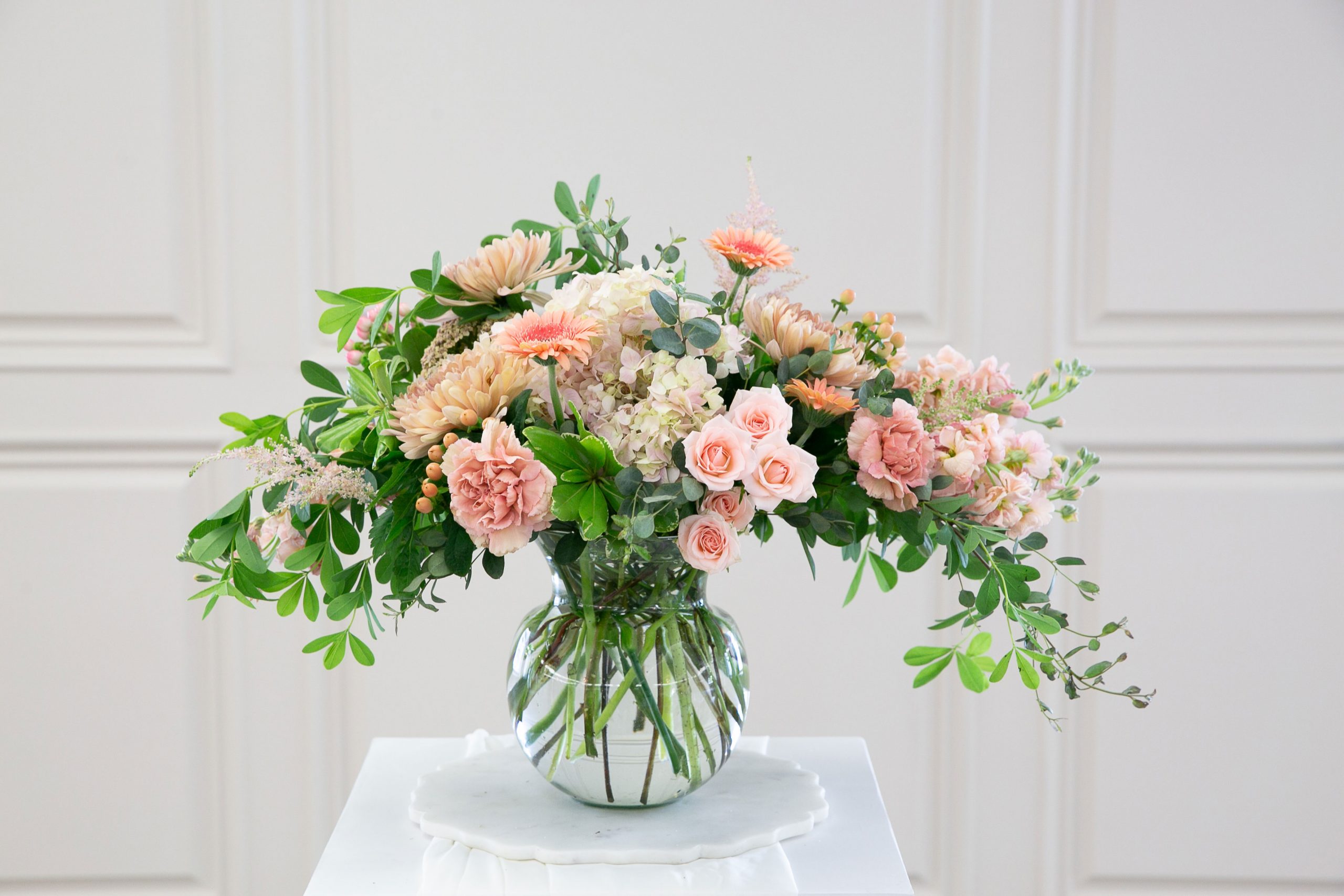 Sentimental Cascade Bouquet with blush blooms and draping greenery by Studley Flower Gardens