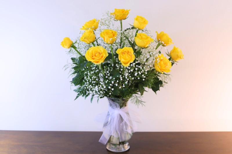 Classic one dozen yellow roses with baby’s breath by Studley Flower Gardens
